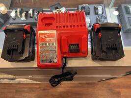 Milwaukee charger w/ two 5.0AH batteries SPB-JH322736