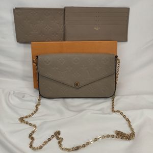 Louis Vuitton Felicie Pochette Monogram Empreinte Leather - Turtledove SPB344799