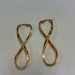 Twisted Infinity Hoop Earrings - YG - 2" x 3/4" - 14K - PPSKN