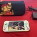 Nintendo Switch Lite  Yellow with Case and Charger - PPSKN